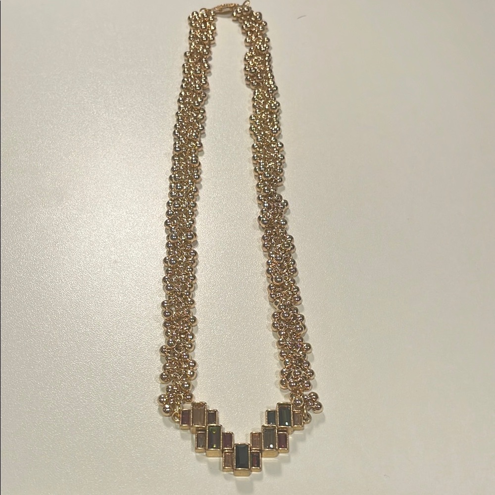 Elegant Gold Necklace with colorful crystals